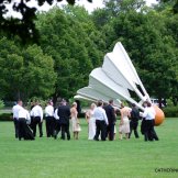 Wedding parties often arrive on the front lawn of the Nelson-Atkins Museum of art to be photographed in front of the shuttlecocks. In fact, I don't think you're officially married in Kansas CIty until you make this ritual visit with your bridesmaids and groomsmen.