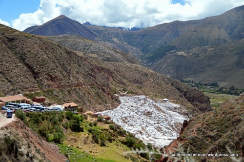More than 3,000 salt evaporation pools in terraces spill down a valley near Maras, Peru. Peruvians have been harvesting salt from these ponds since before Inca times. The unpaved, narrow mountain roads don't stop tour buses and taxis from bringing many tourists to see this beautiful place.